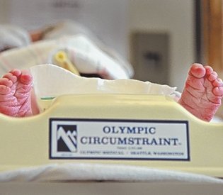 Circumstraint restrains a baby as the most sensitive part of his body is cut